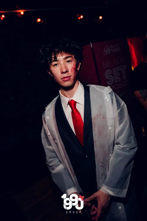 Young man in costume at a Halloween party organized by 1990 Group in New York.