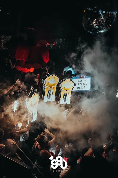 Birthday celebration with smoke effects and lights at the Fridays party at TAO, a New York club, event organized by 1990 Group.